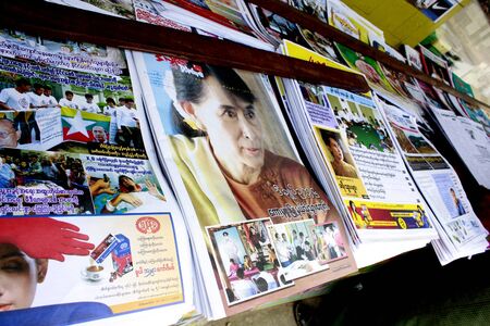 Lifestyle of Myanmar People still wear sarong and worship Buddhism.House Much have Aung San Suu Kyi on the wall.のeditorial素材