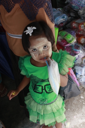 Lifestyle of Myanmar People still wear sarong and worship Buddhism,woman make up with Tanaka or Thanaka Powder.のeditorial素材