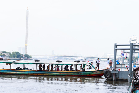 Bangkok,Thailand - September 18, 2015 : The passengers disembark from ferry boat that cross Chao Phraya River.のeditorial素材