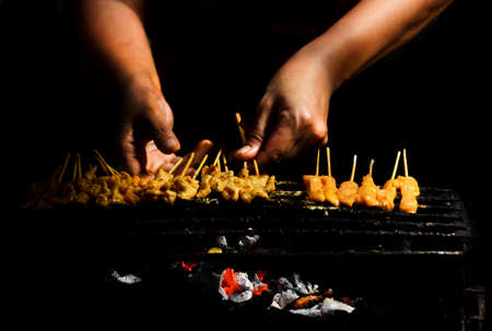 Chicken satay,cook by grilled on fire.May be beef pork or chicken.の写真素材