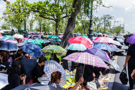 Bangkok, Thailand - October 14, 2016 :  Thai people are wearing black, white or dark coloured clothes during the mourning period for the funeral of His Majesty King Bhumibol Adulyadej.のeditorial素材