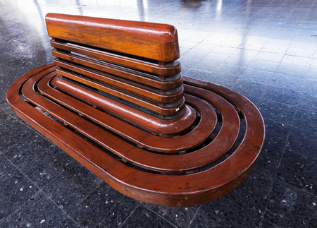 Vintage wooden bench at railway platform, The old style seating.の写真素材