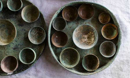 The old brass, ancient bowl brass and tray brass in antique shop.の写真素材