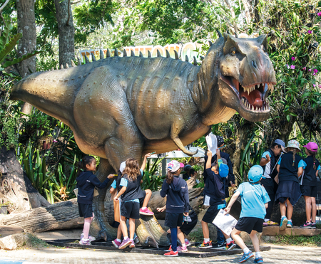 Chonburi,Thailand - 9 February 2016 : Young student from International School interest dinosaur...