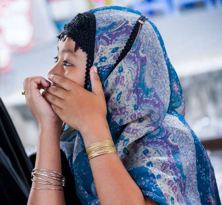 Bangkok, Thailand - April 1 2012 : Muslim girls cover head with hijab, at train staion to back home at south province of Thailand.のeditorial素材