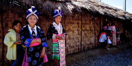 Luang Prabang, Laos - January 1, 2006 : Laos hill tribes girls in traditional tribes dress.のeditorial素材