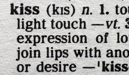 Kiss. Close-up of the word 'Kiss' in a dictionary. Structured Lighting Of The Page, Paperの写真素材