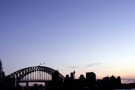 Sydney Harbour Bridge And City Silhouette After Sunset, Australiaの写真素材