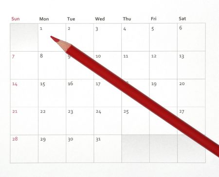 A Red Pencil Laying On A Paper Structure Monthly Business Calendar, Backgroundの写真素材