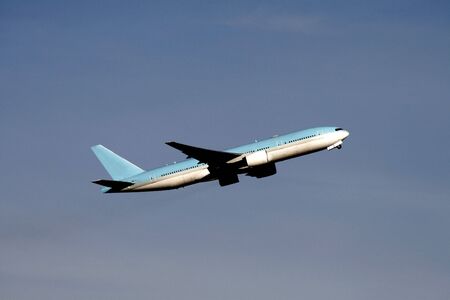 Large Blue White Airplane In The Blue Sky, Ascending 