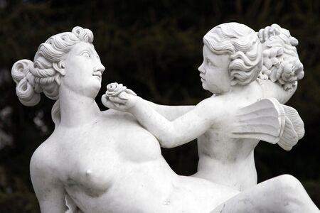 Woman And Young Angel In Paradise, White Sculptureの写真素材