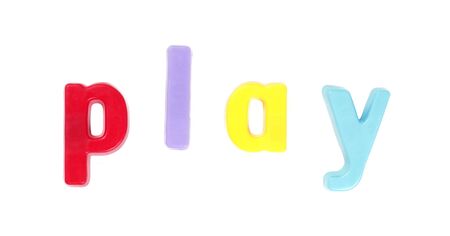 Play - Colourful Fridge Magnets On A White Backgroundの写真素材