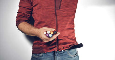 Man holding colored pens in handの写真素材