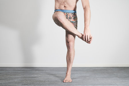 Male legs showing pain in foot