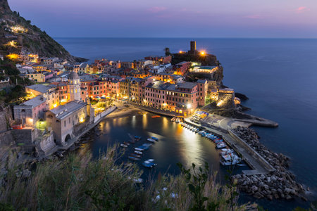 View from high hill of Vernazza houses and blue sea, Cinque Terre national park, Liguria, Italyの写真素材