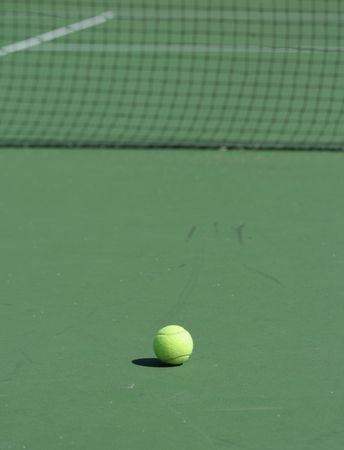 Ball on tennis courtの写真素材