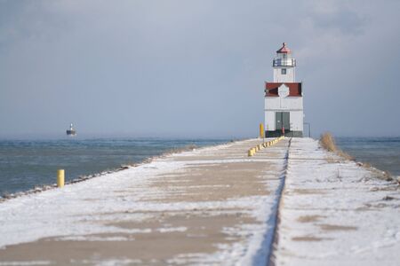 Lighthouse at end of pierの写真素材