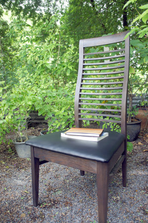 reading book and relaxing  chairの写真素材