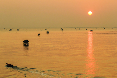 Silhouette view at sunrise time of bamboo cottage at Bang Tabun, Phetchaburi, Thailandの写真素材