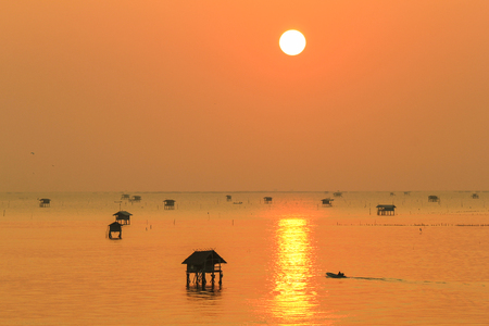 Silhouette view at sunrise time of bamboo cottage at Bang Tabun, Phetchaburi, Thailandの写真素材