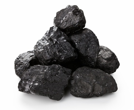 Stack of coal lumps isolated on white background    の写真素材