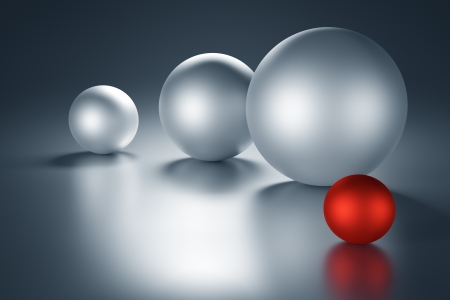Red metal ball next to other metal balls with copy space. 3d renderの写真素材