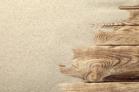 Sand on planked wood. Summer background with copy space. Top viewの写真素材
