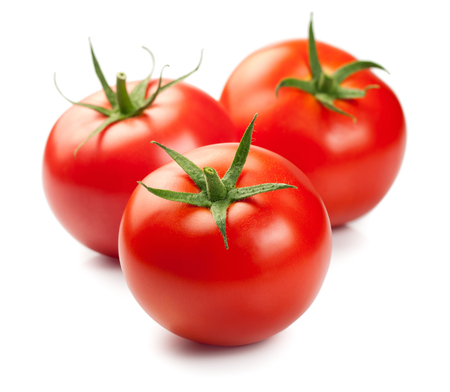 Three red ripe tomatoes isolated on white backgroundの写真素材