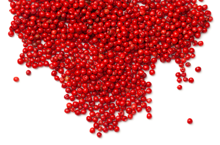 Pink pepper. Red peppercorns isolated on white background. Top viewの写真素材