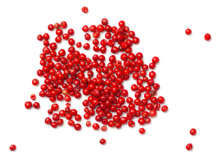 Pink pepper. Red peppercorns isolated on white background. Top viewの写真素材
