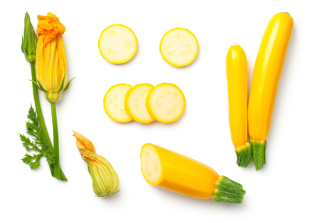 Yellow zucchini with leaf and flower isolated on white background Top viewの写真素材