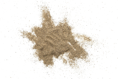 Black pepper powder isolated on white background. Top viewの写真素材