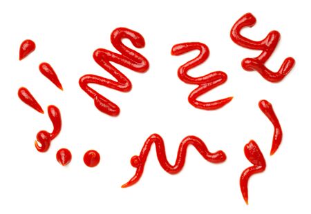 Ketchup splashes isolated on white background. Tomato sauce. Top view, flat layの写真素材