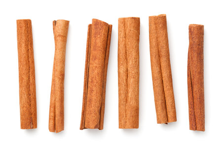 Cinnamon sticks isolated over white background. View from aboveの写真素材