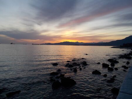 Sunset over the oceanの写真素材