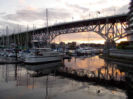 Sunset behind Granville bridge and marinaのeditorial素材