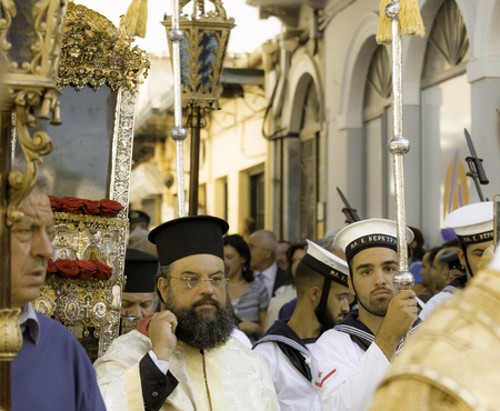 CORFU, GREECE - AUGUST, 12, 2016: Clerics and philharmonic musicians in the customary lament...
