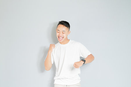 a young Asian is dancingの写真素材
