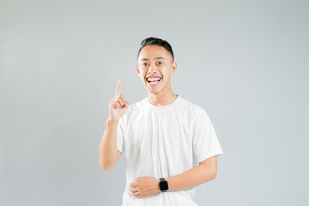 a young asian who is looking for ideasの写真素材