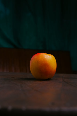 red apple on a beautiful wooden base
