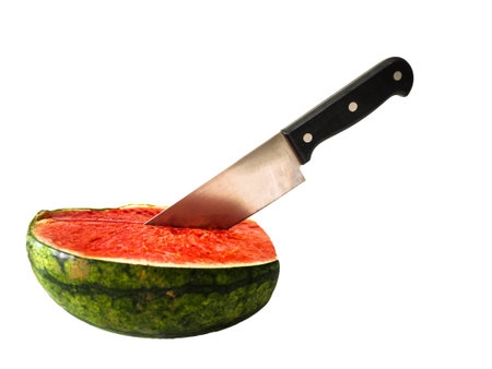 cut watermelon by knife on the white backgroundの写真素材