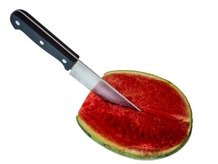 cut watermelon by knife on the white backgroundの写真素材