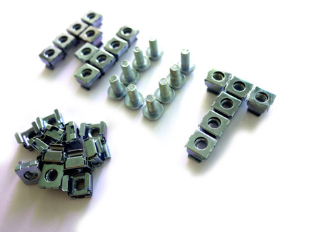 bolts, nuts and screws on a white backgroundの写真素材