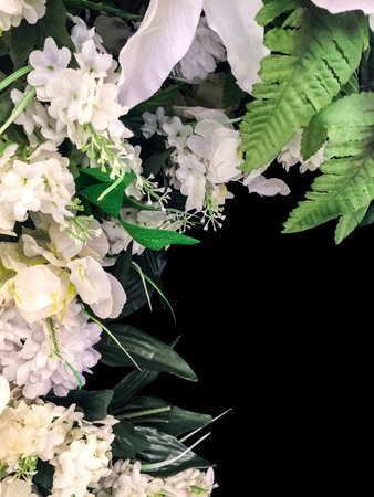 Flowers frame on black backgroundの写真素材