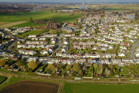 Aerial view of a city and farm fieldsの写真素材
