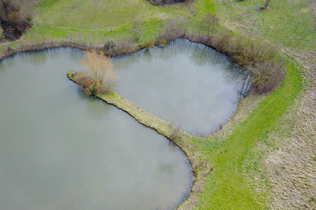 Aerial view of a pond in a parkの写真素材