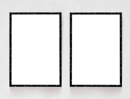Two blank banners with wooden frame on plaster wall backgroundの写真素材