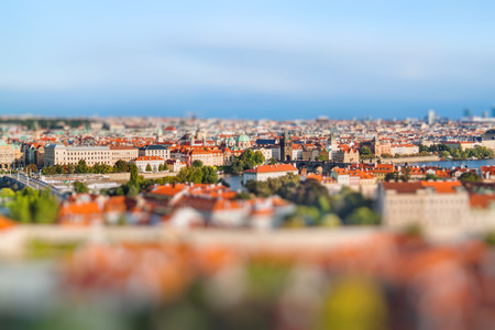 Aerial view of Prague, Czech Republic on a sunny evening. Miniature tilt shift lens effect.の写真素材