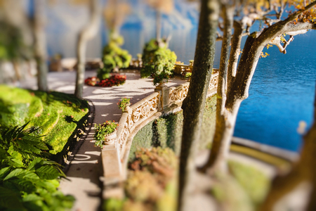 The park of Villa Balbianello in Lenno, Lake Como, Italy. Miniature tilt shift lens effect.の写真素材