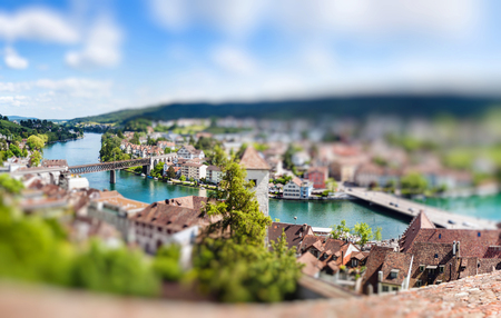 Panoramic view of Swiss town Schaffhausen. River Rhine. Europe. Miniature tilt shift lens effect.の写真素材